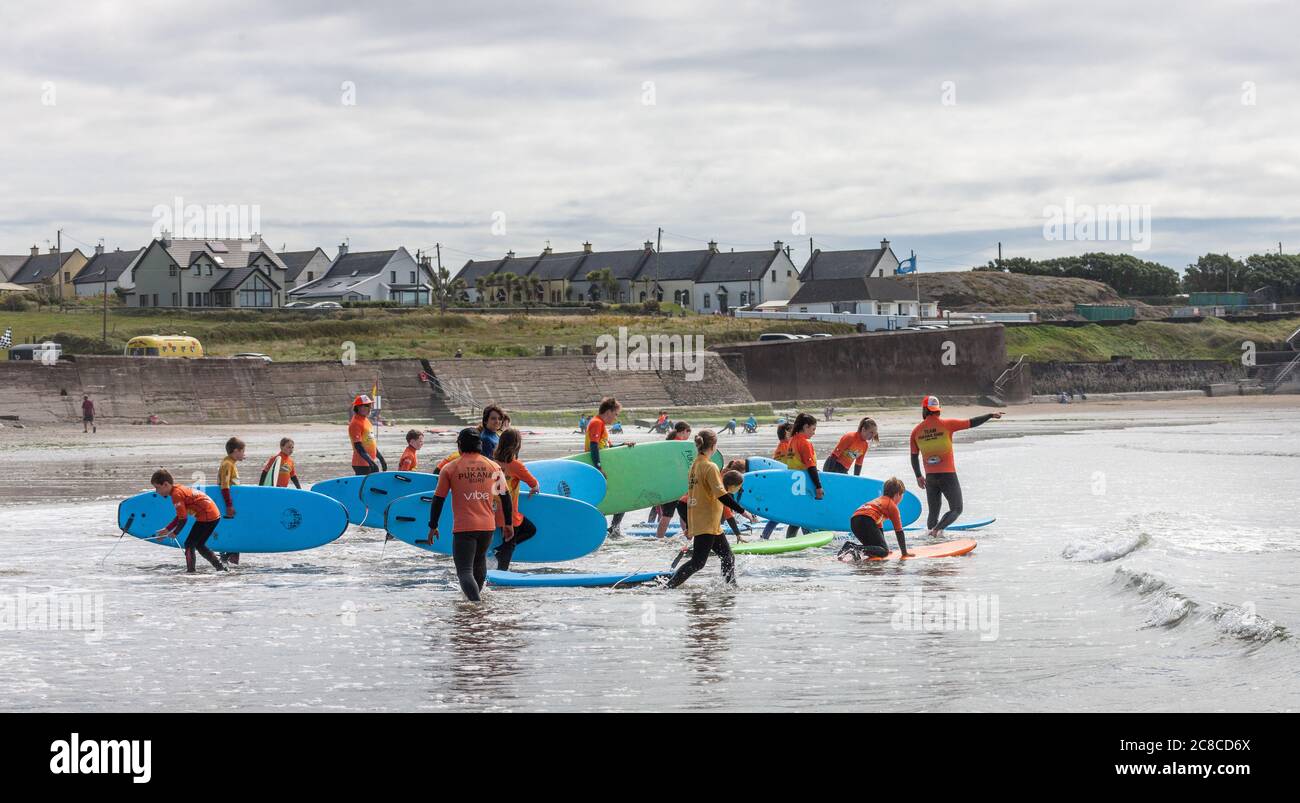 Garrettstown, Cork, Ireland. 23rd July, 2020. Pupils of the Pukana Surf School take to the water for the first time during their summer camp at Garrettstown, Co. Cork, Ireland. - Credit; David Creedon / Alamy Live News Stock Photo