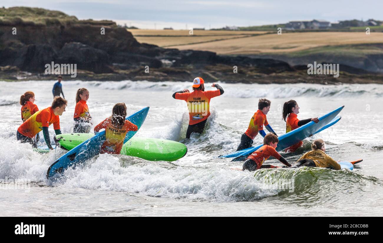 Garrettstown, Cork, Ireland. 23rd July, 2020. Pupils of the Pukana Surf School take to the water for the first time during their summer camp at Garrettstown, Co. Cork, Ireland. - Credit; David Creedon / Alamy Live News Stock Photo