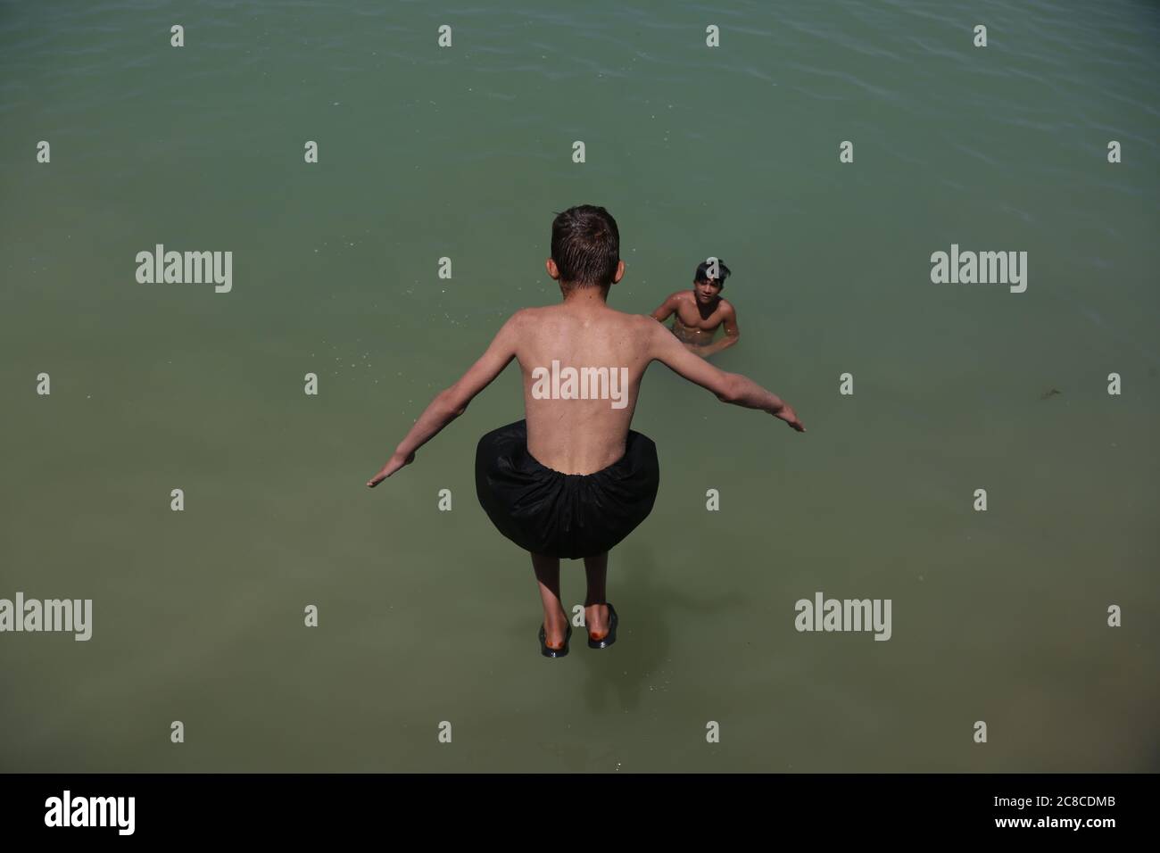 Kabul Afghanistan 23rd July An Afghan Boy Dives Into A Lake To Cool Off On A Hot Summer Day In Kabul Capital Of Afghanistan July 23 Credit Rahmatullah Alizadah Xinhua Alamy Live Kabul Afghanistan 23rd July An Afghan Boy Dives Into A Lake To Cool Off On A Hot Summer Day In Kabul Capital Of Afghanistan July 23 Credit Rahmatullah Alizadah Xinhua Alamy Live