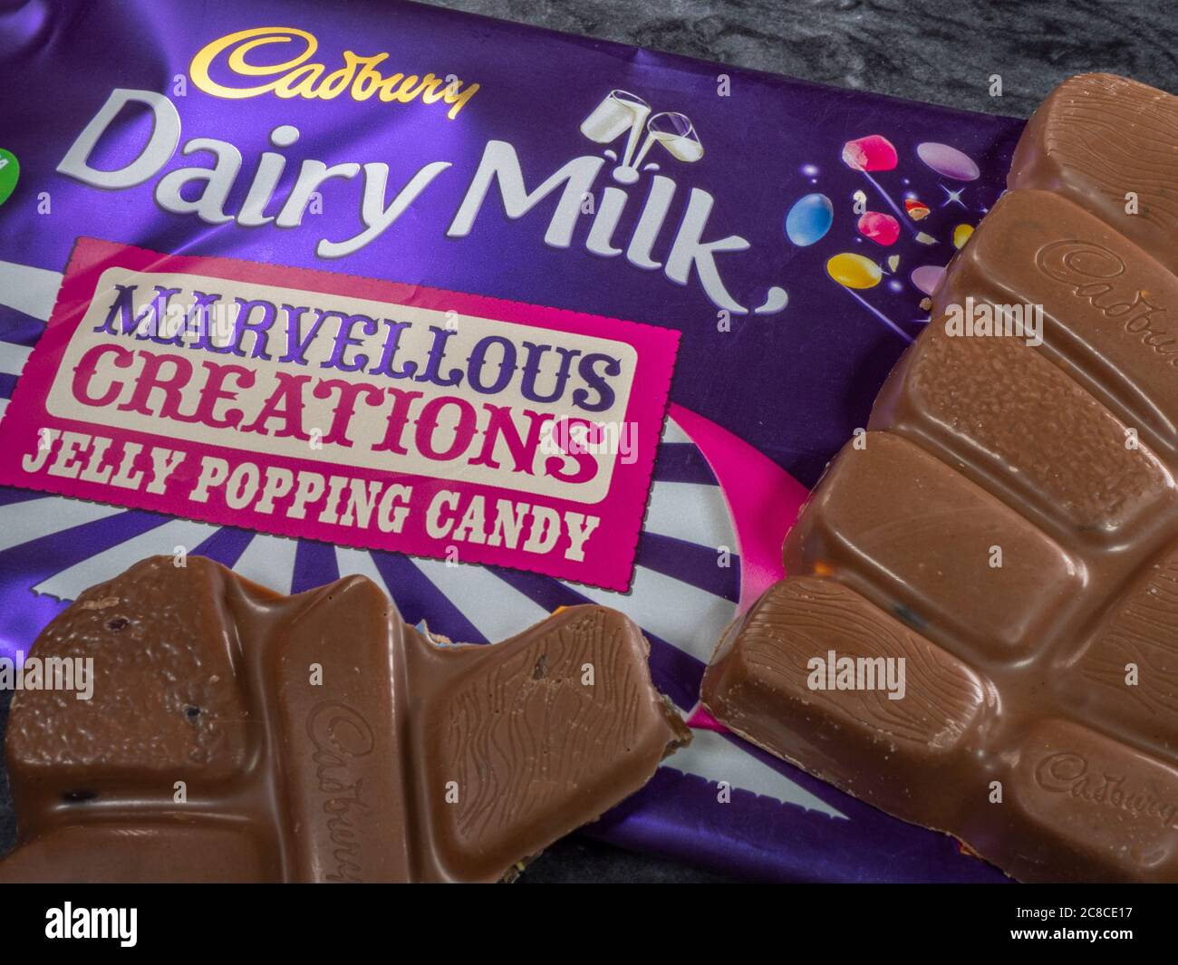 Closeup of Cadbury Dairy Milk, marvellous creations, jelly popping candy – retail product wrapper with chocolate pieces on the outside. Stock Photo