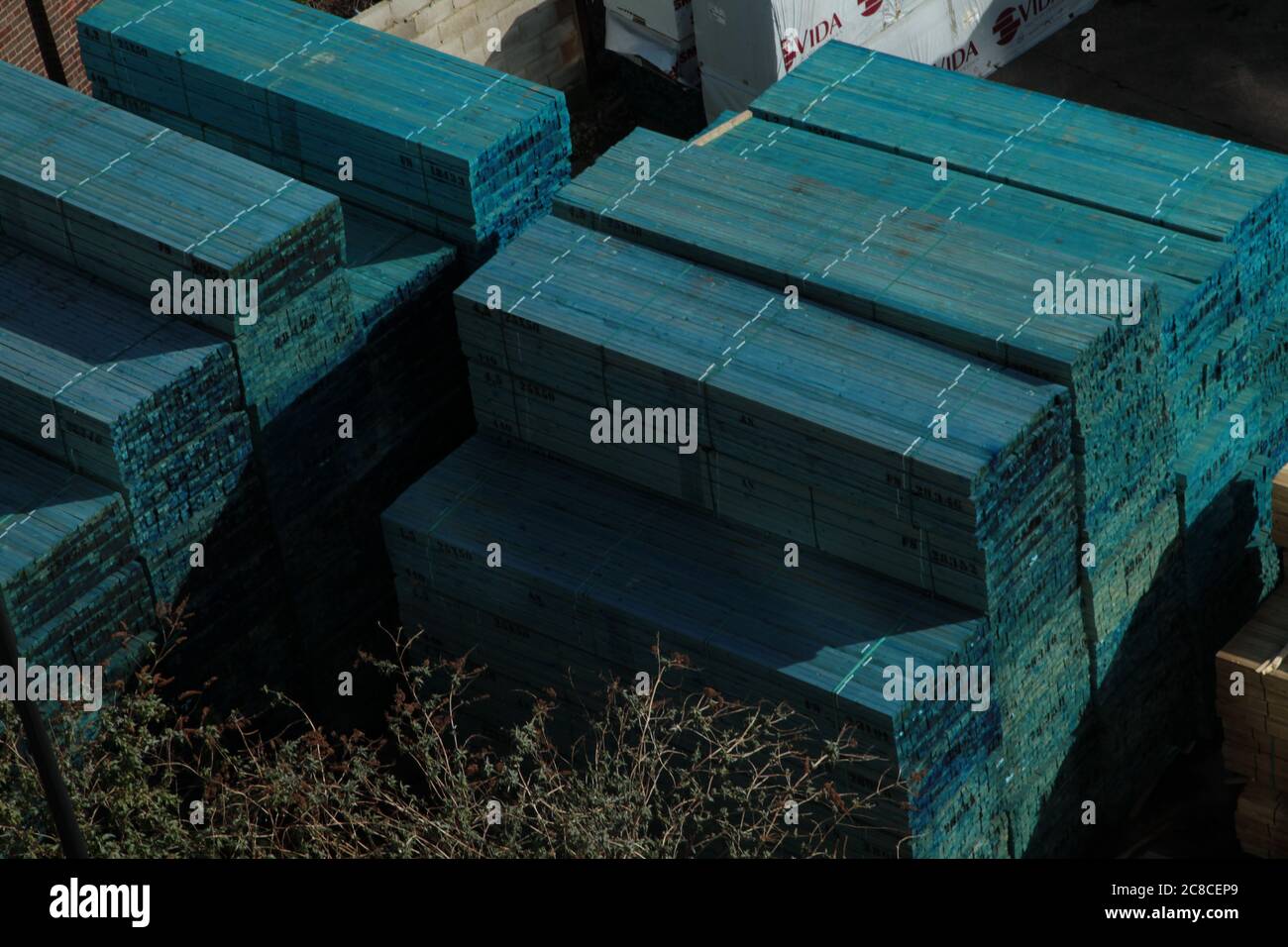Timber yard with packs of dimensioned softwood from Sweden Stock Photo