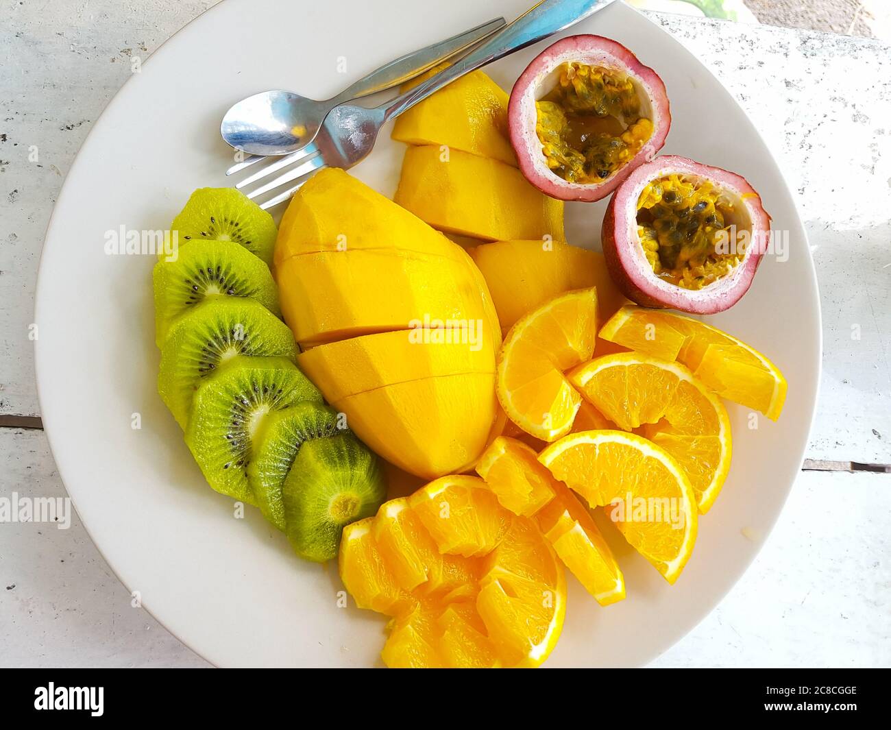 Portrait of Healthy Fruits Served On Plate Stock Photo