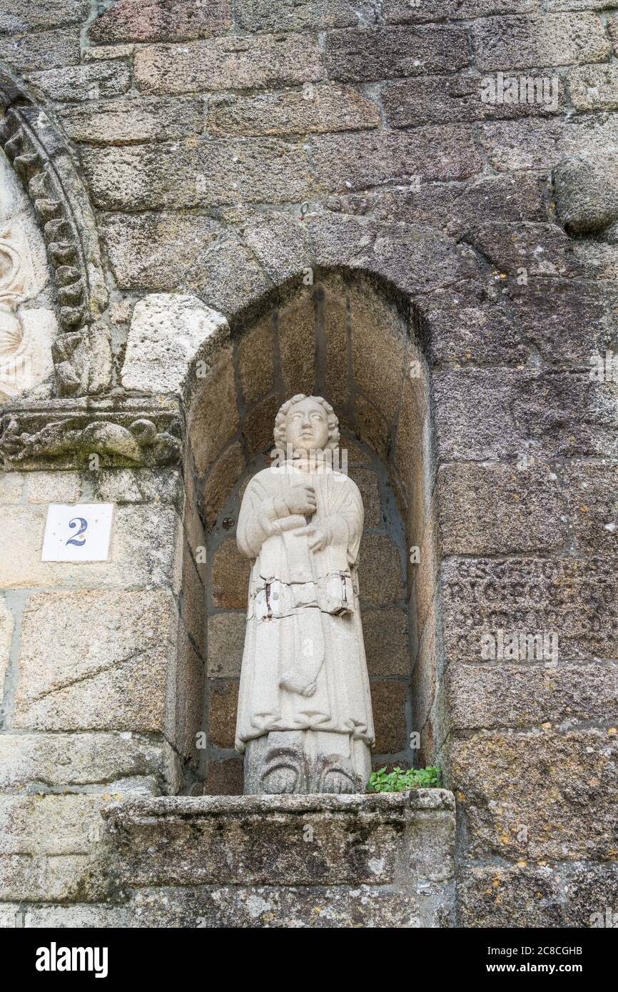 Statue on facade of Church Santa María del Azogue in Betanzos, Galicia, Spain Stock Photo