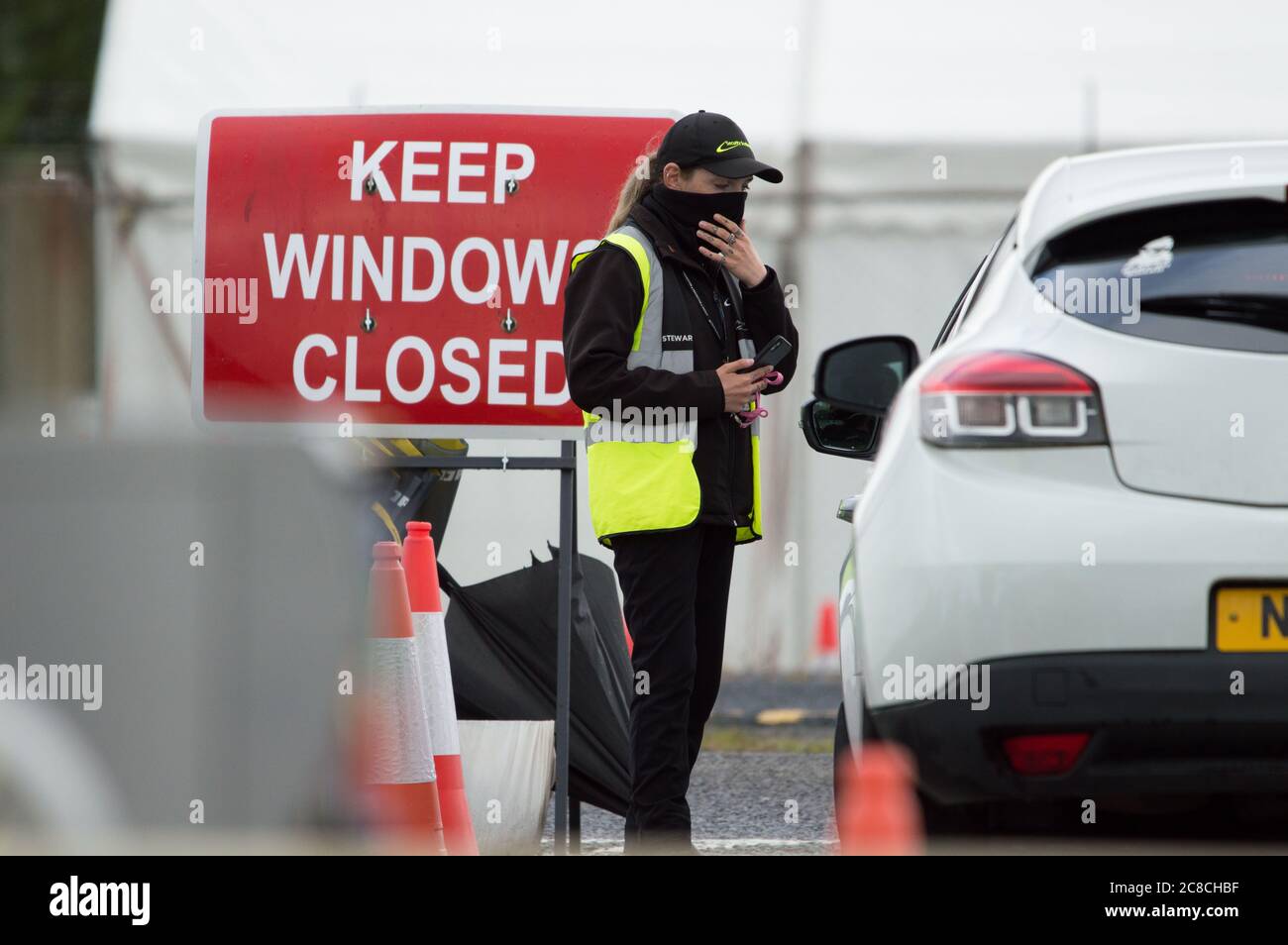 Glasgow, Scotland, UK. 23rd July, 2020. Pictured: People going to the covid19 field testing centre at Glasgow Airport. Credit: Colin Fisher/Alamy Live News Stock Photo