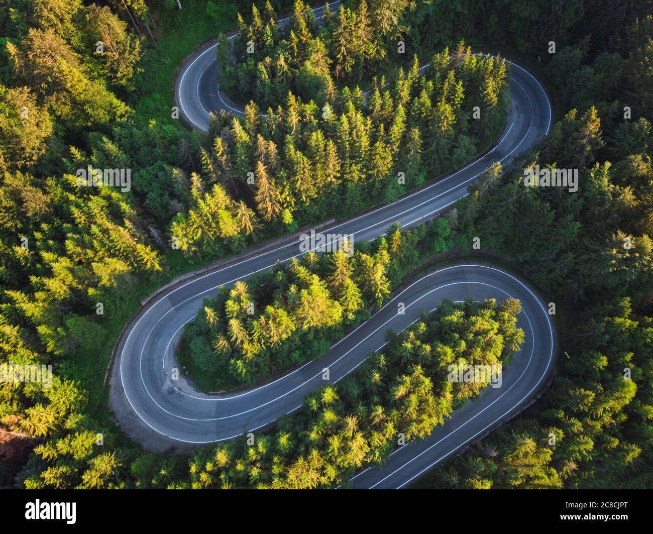 Aerial landscape of mountain winding road, in Transylvania Stock Photo