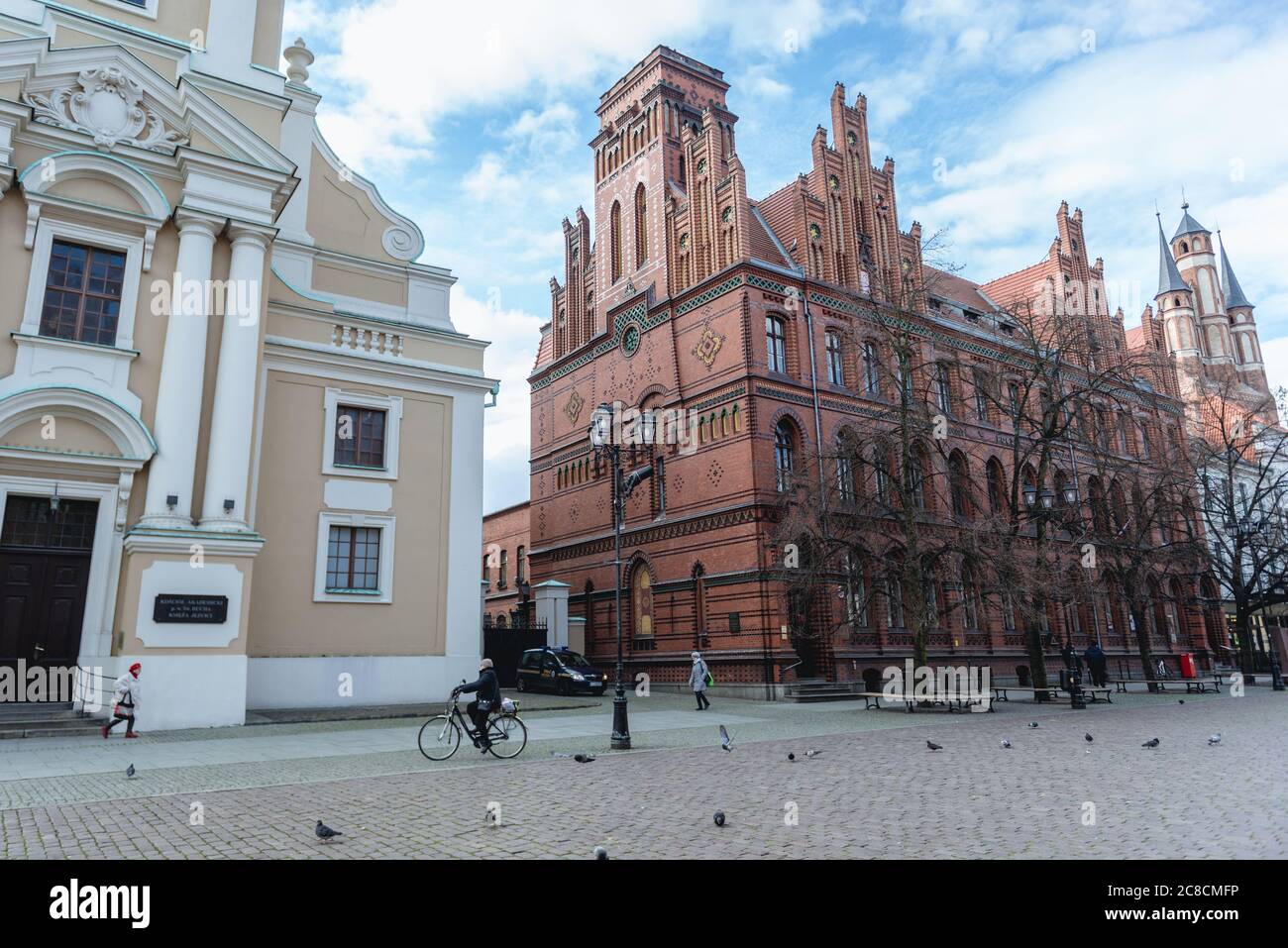 Church of the Holy Spirit and Central Post Office building on the main square of Old Town of Torun, Kuyavian Pomeranian Voivodeship of Poland Stock Photo