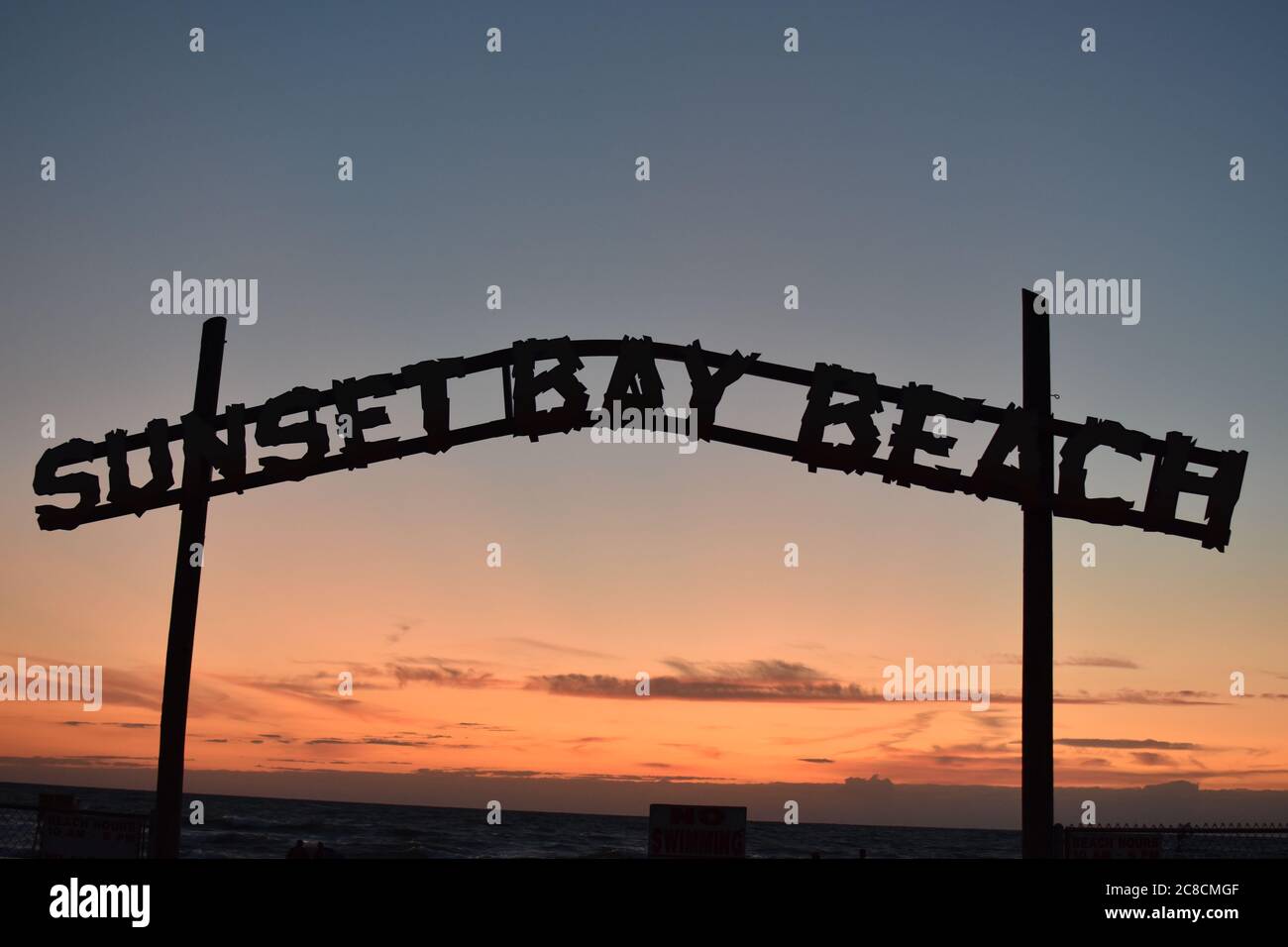 Sunset Bay Beach entrance sign Stock Photo Alamy