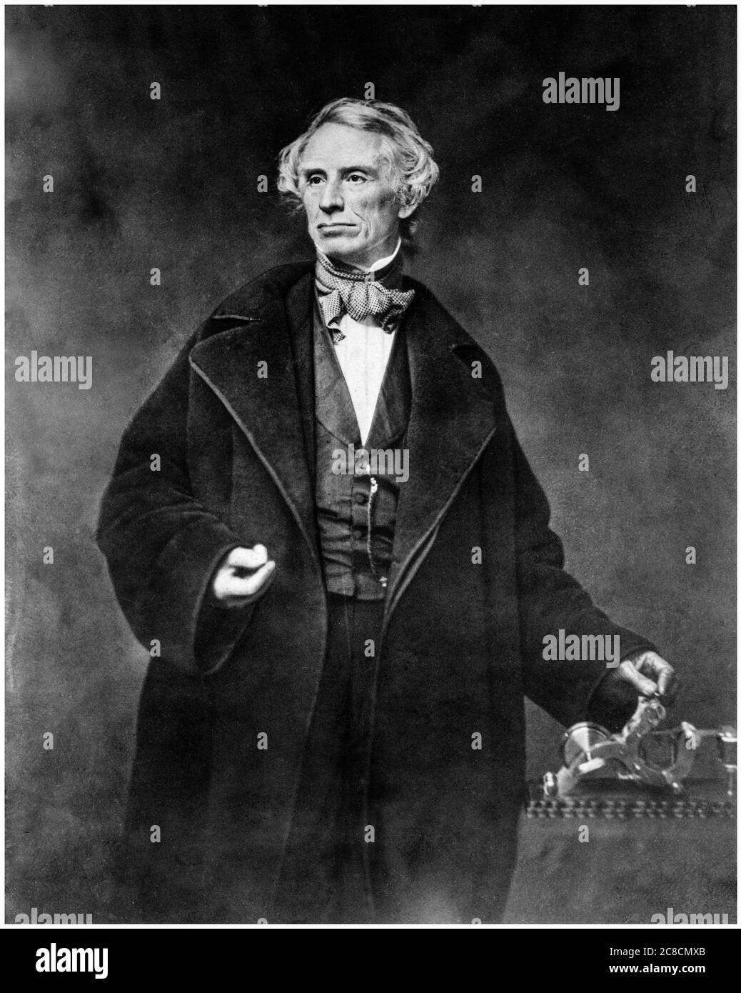 Samuel Finley Breese Morse (1791-1872), American inventor of Morse Code, pictured with single wire telegraph apparatus, portrait photograph by Mathew Brady Studio, circa 1850 Stock Photo