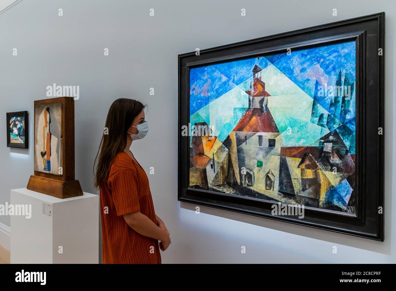 EMBARGOED TILL 0900 GMT 24/7/20 - Lyonel Feininger, Zottelstedt II (Town Hall II), Estimate: £2-3 million - Sotheby's London present a preview of a one-off auction and exhibition that spans over half a millennium of art history. From Rembrandt to Richter, the sale will offer Old Masters, Impressionist & Modern Art, Modern & Post-War British Art and Contemporary Art - travelling through the Italian Renaissance and the Dutch Golden Age, to the revolutionary birth of Modernism, and the invasion of Pop Art and Post-modern Abstraction. The exhibition has opened to the public in Sotheby's New Bond S Stock Photo