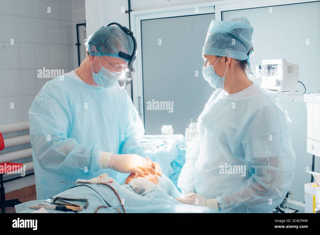 Blue plastic surgery mask hi-res stock photography and images - Alamy