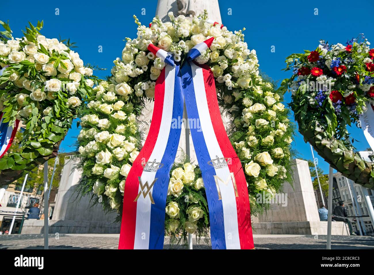 Amsterdam, Netherlands - May 5, 2020: Wreaths at the National Monument on the occasion of remembrance of the worldwar II in Amsterdam the Netherlands Stock Photo