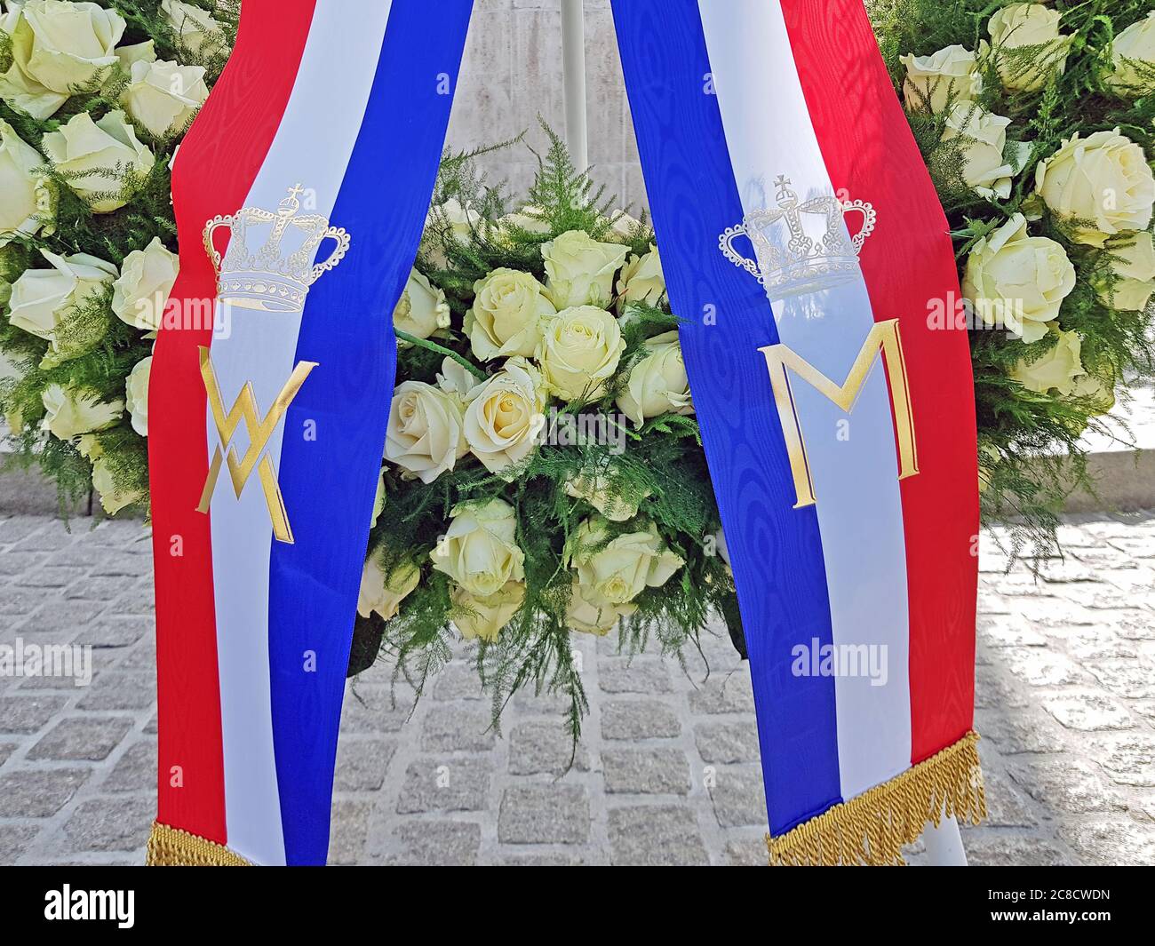 Amsterdam, Netherlands - May 4, 2020: Wreath laying at the National Monument on the Dam by the king and the queen from the Netherlands Stock Photo