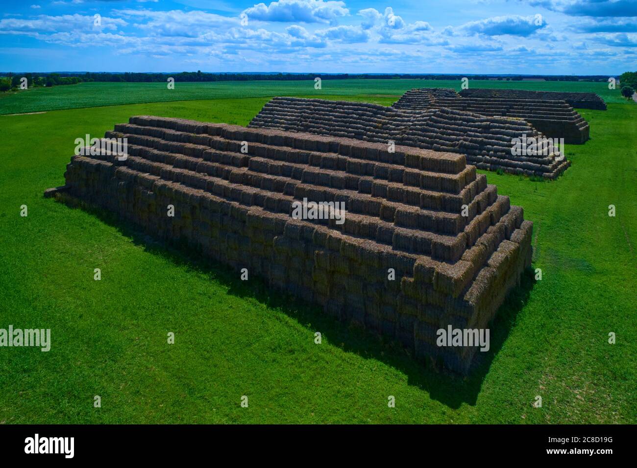 Aerial view of big pyramids made out of rectangular haystacks Stock ...