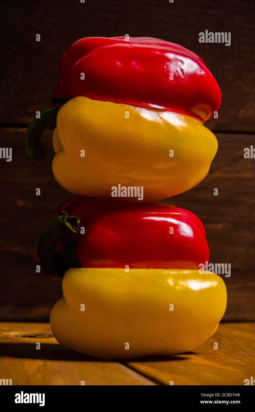 fresh peppers on wooden boards Stock Photo - Alamy