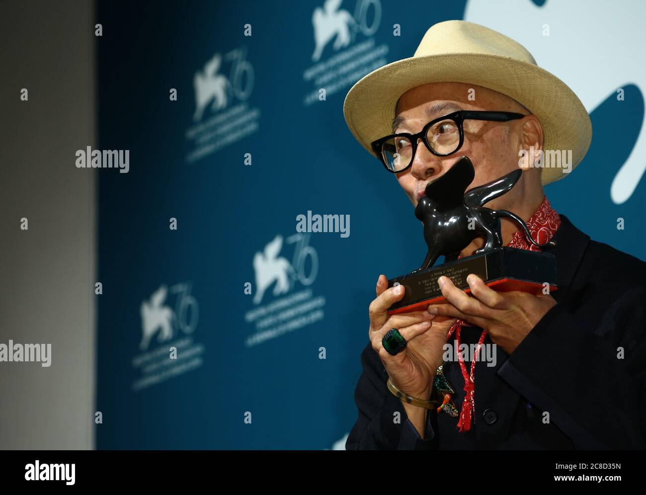 VENICE, ITALY - SEPTEMBER 07: Yonfan poses with the Award for Best