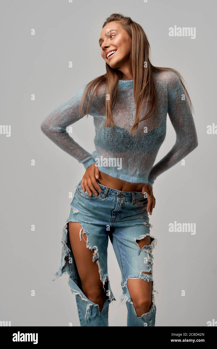 Girl in ripped jeans hi res stock photography and images Alamy
