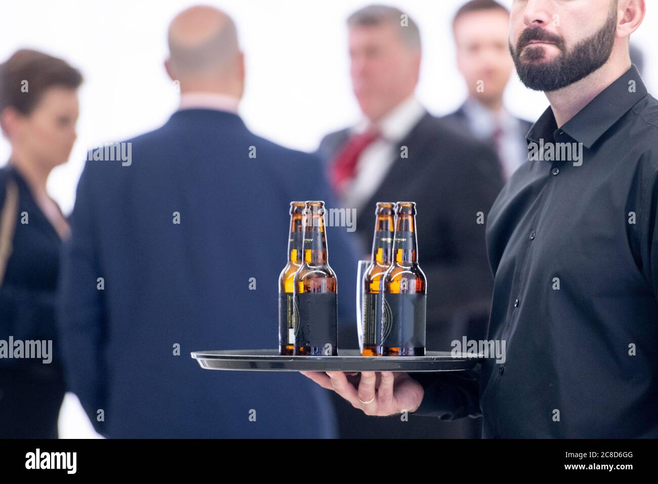 People drinking beer at events receptions and bars Stock Photo