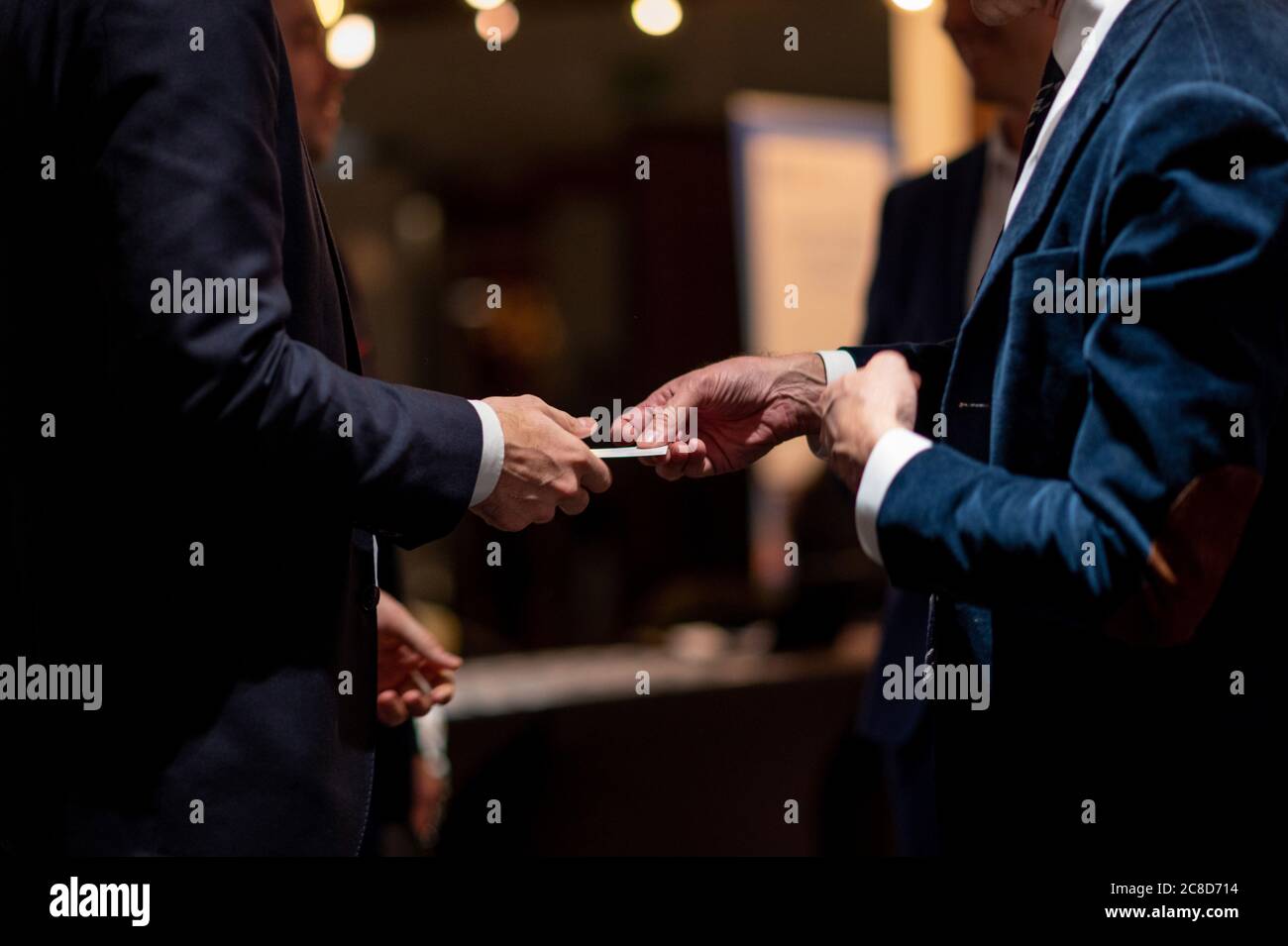 Exchange Business Cards at a Meeting Event Stock Photo