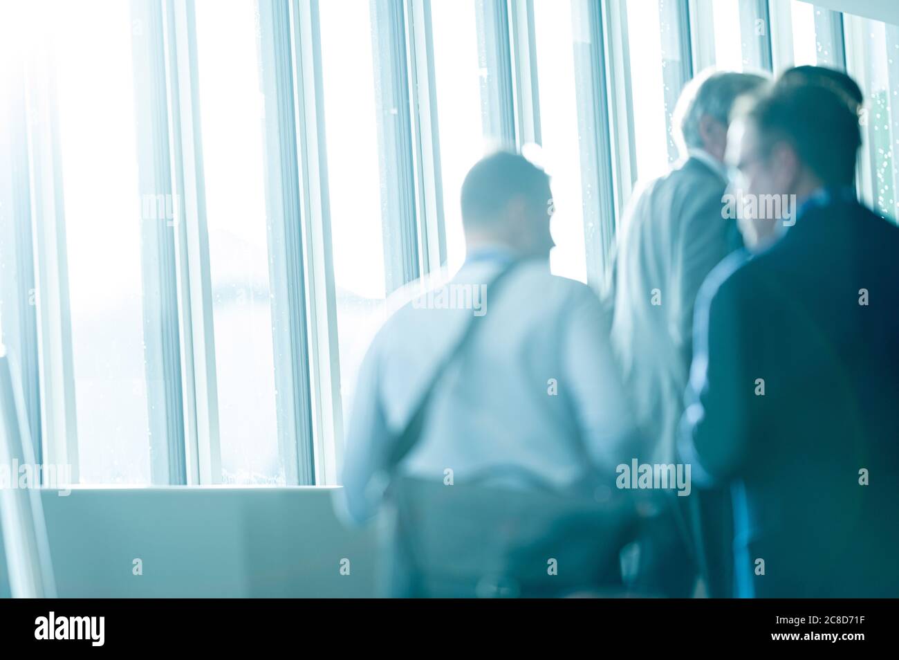 People walking on a Staircase at Business and Academic Conference Event Stock Photo