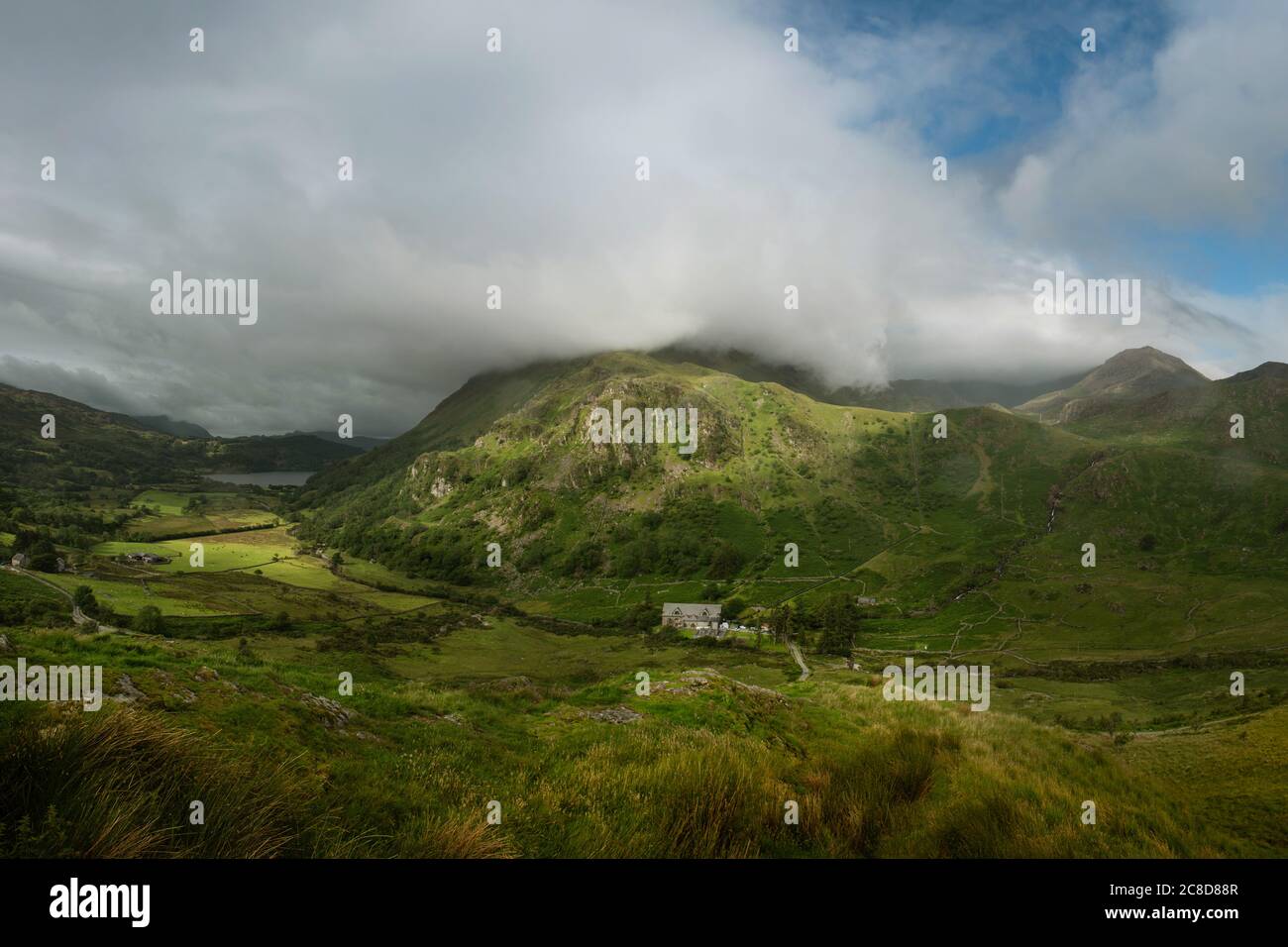 Landscape with mountains and clouds Stock Photo - Alamy