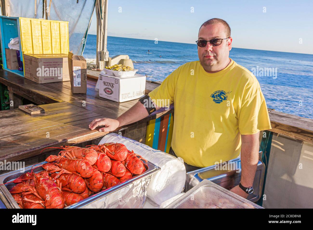 Cocoa Beach Florida,Cocoa Beach Pier,Atlantic Ocean water man men male adult adults,cook,server