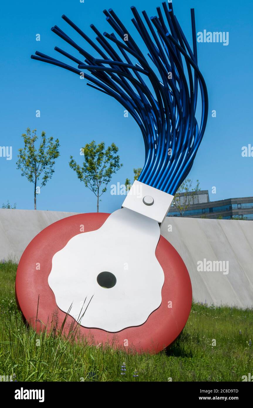 Large sculpture of wheel typewriter eraser with brush in Olympic
