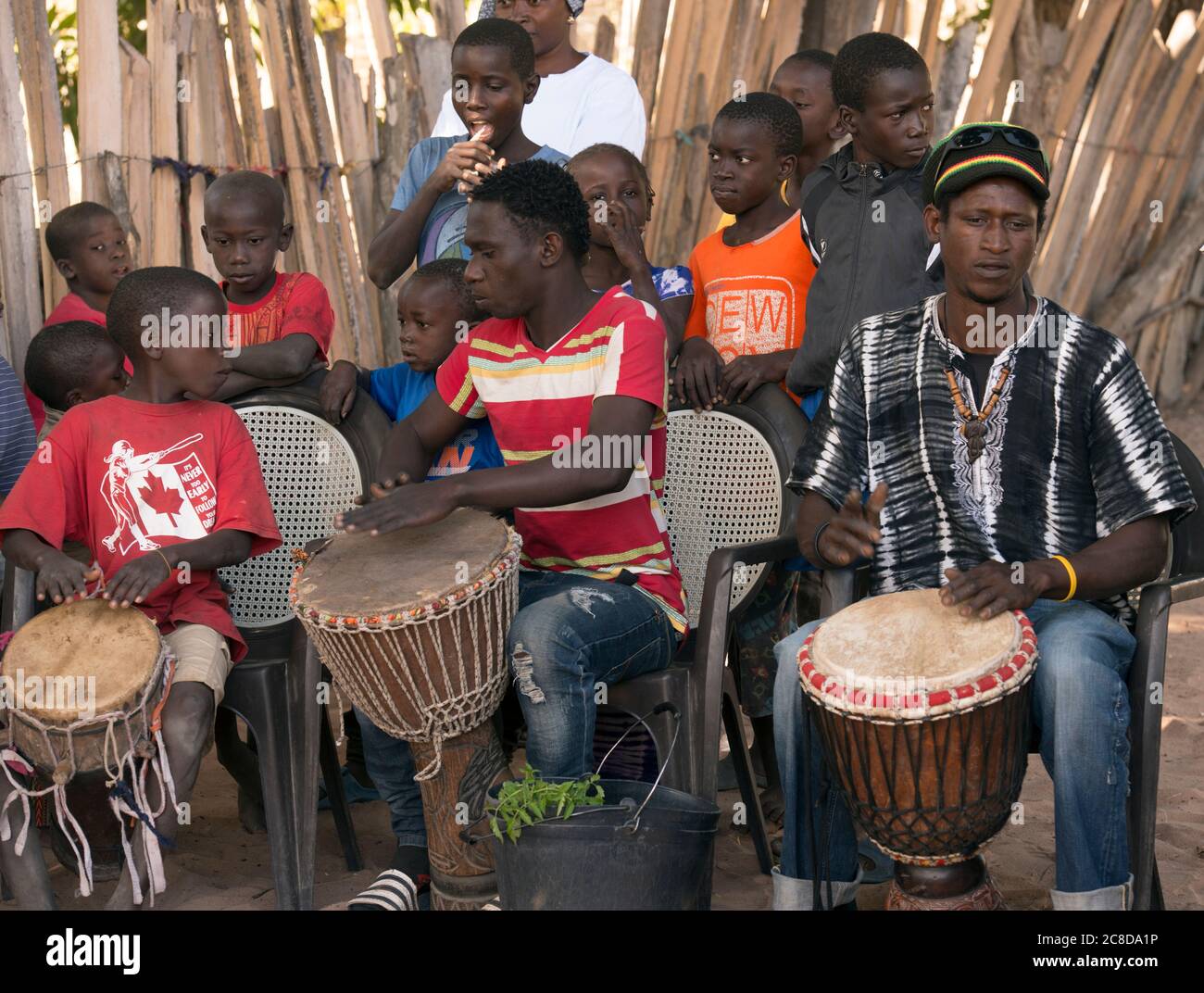 Indigenous Jola people playing drums during a chanting ritual in the village  of Berending, The Gambia, West Africa Stock Photo - Alamy