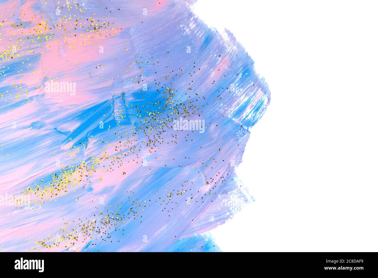 Pastel acrylic brush stroke with golden glitter on a white background ...