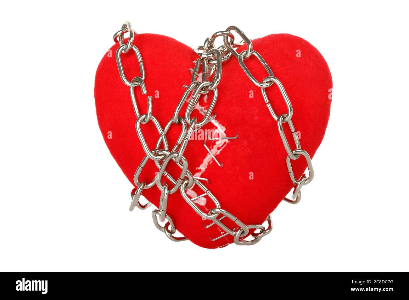 chain wrapped around broken heart with staples isolated Stock Photo Alamy