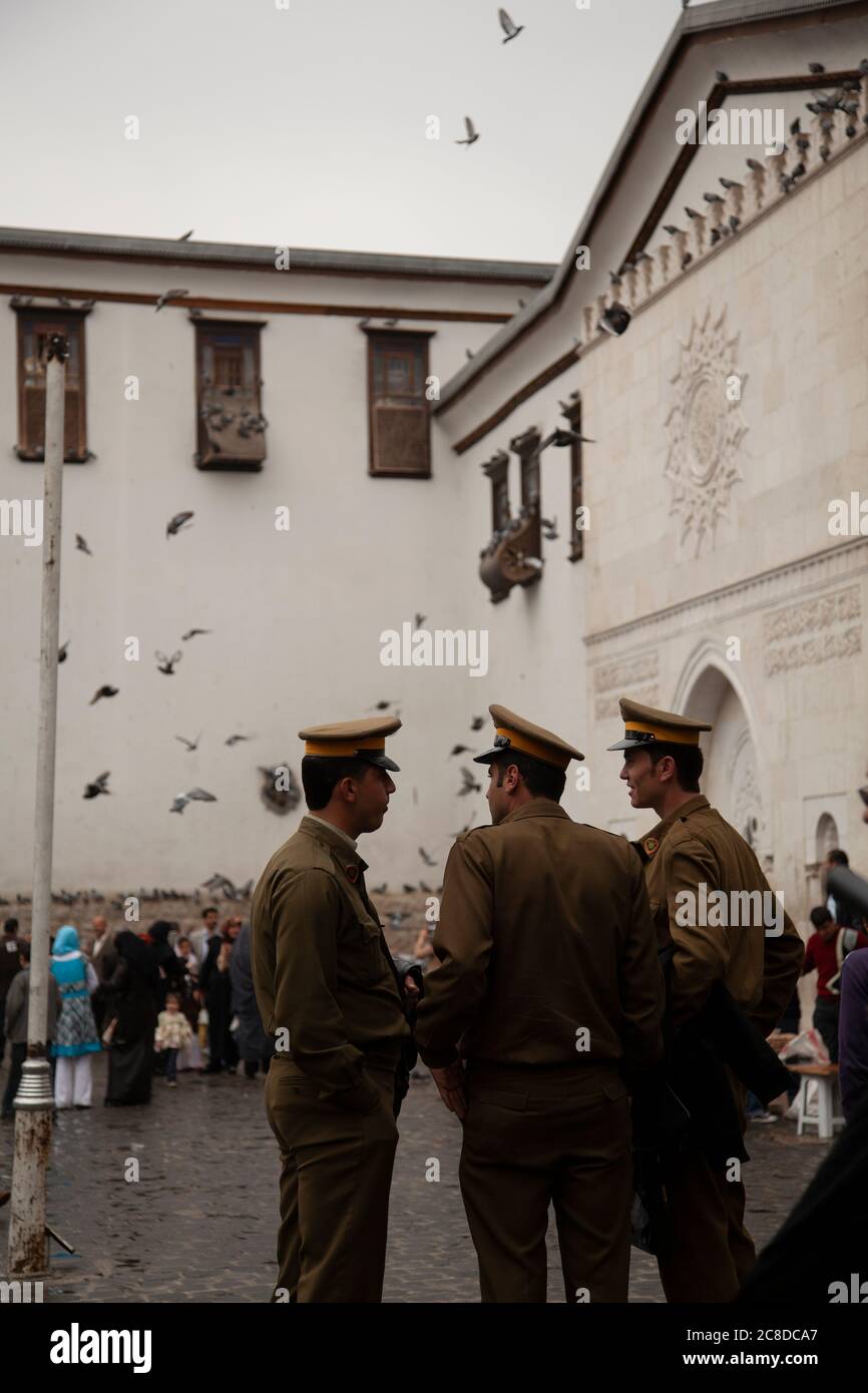 Damascus, Syria 03/28/2010: Three members of the Syrian Army are doing