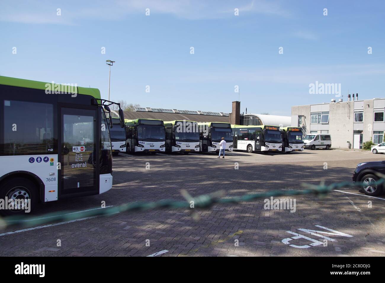 Bus parking for Connexxion buses in the Dutch city of Alkmaar. Netherlands, April Stock Photo