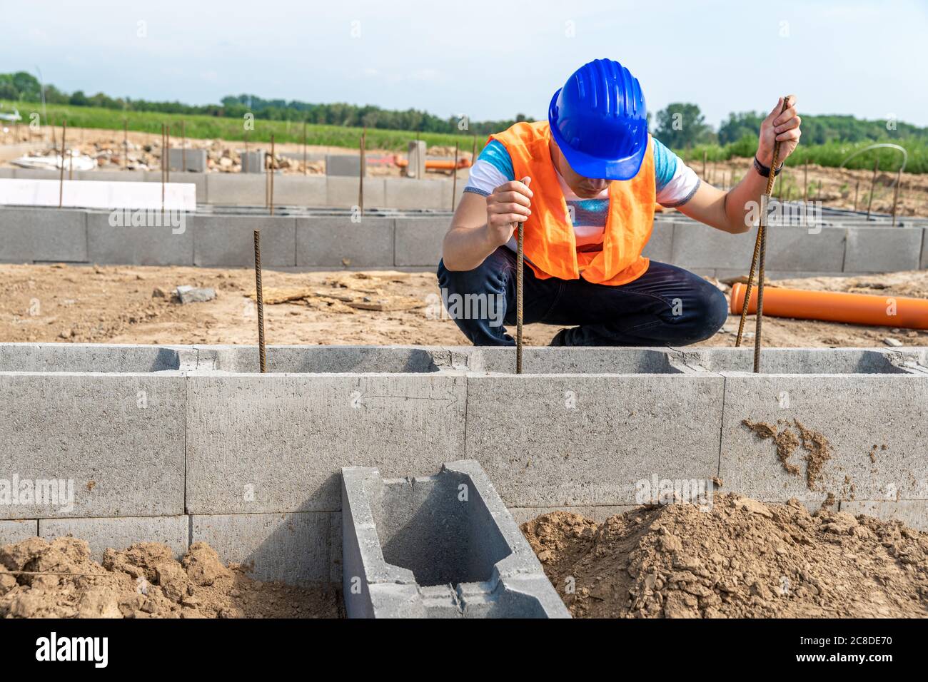 the construction worker builds the foundation of the building Stock ...