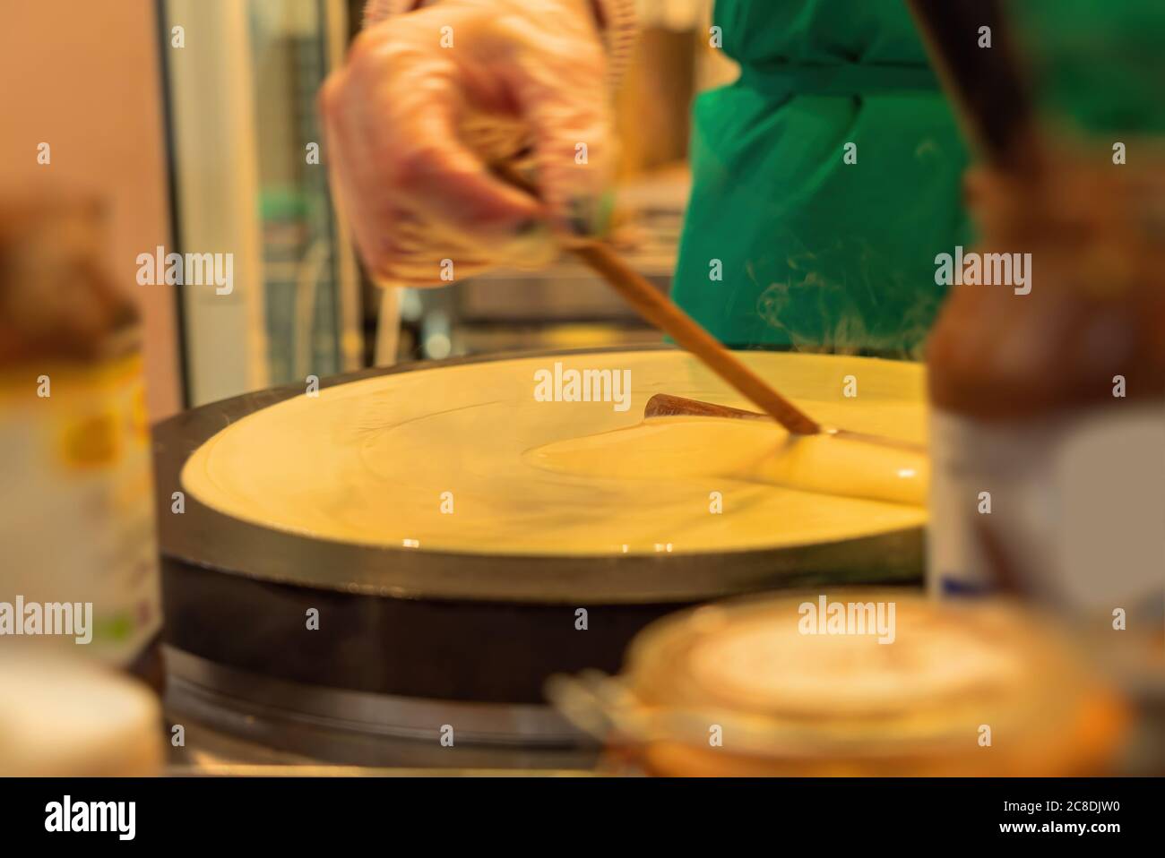 French pancake cooking process. Street food in Paris Stock Photo Alamy