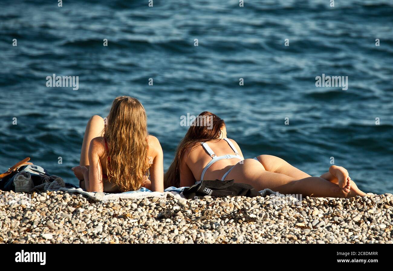 Sunbathing on the beach Stock Photo