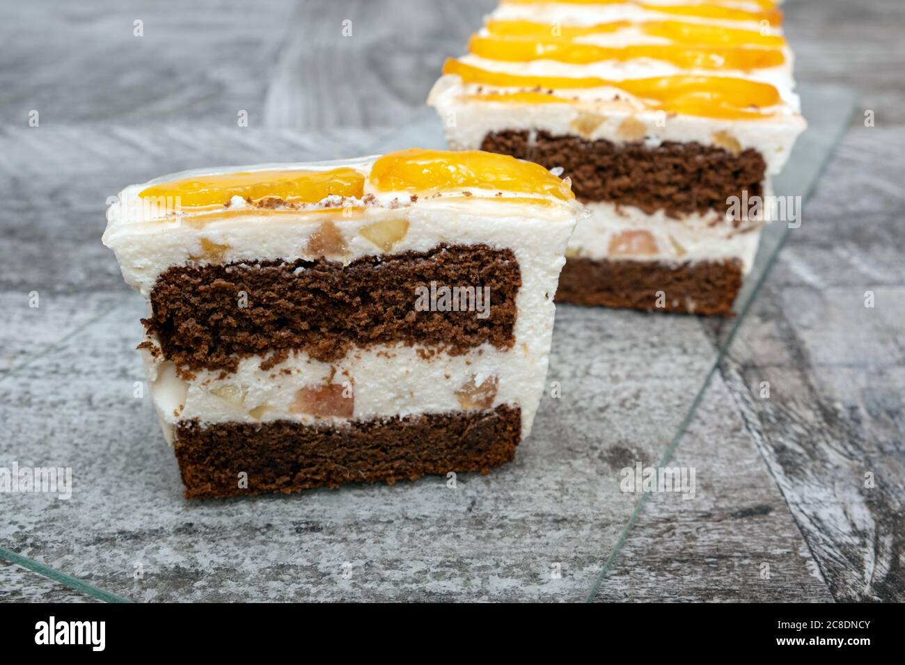 Homemade cream cake with peaches and mascarpone cheese Stock Photo