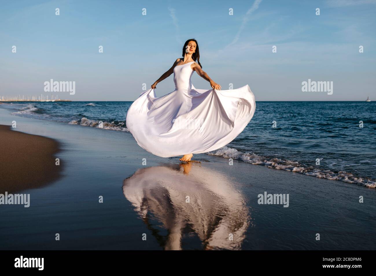 Woman in dress dancing turning hi-res stock photography and images - Alamy