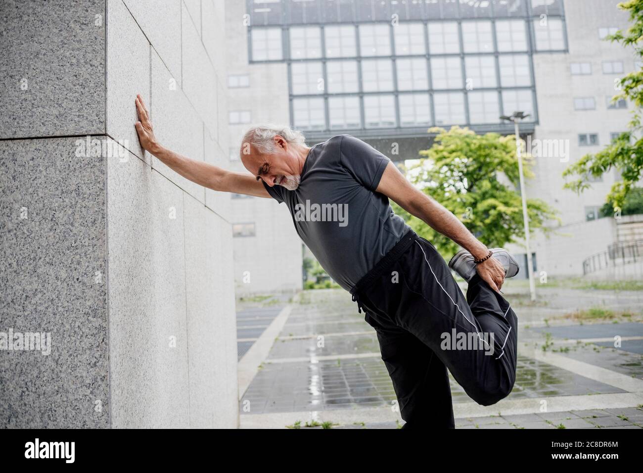 Senior standing on one leg hi-res stock photography and images - Alamy
