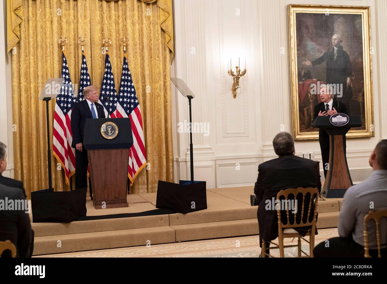 Washington, United States Of America. 22nd July, 2020. Washington, United States of America. 22 July, 2020. U.S. President Donald Trump listens as Sam Vigil talks about the murder of his wife during the announcement of Operation Legend, to combat violent crime in the East Room of the White House July 22, 2020 in Washington, DC Trump plans to send federal law enforcement to cities around the country in what is widely viewed as an attempt to suppress Black Lives Matter protests. Credit: Shealah Craighead/White House Photo/Alamy Live News Stock Photo