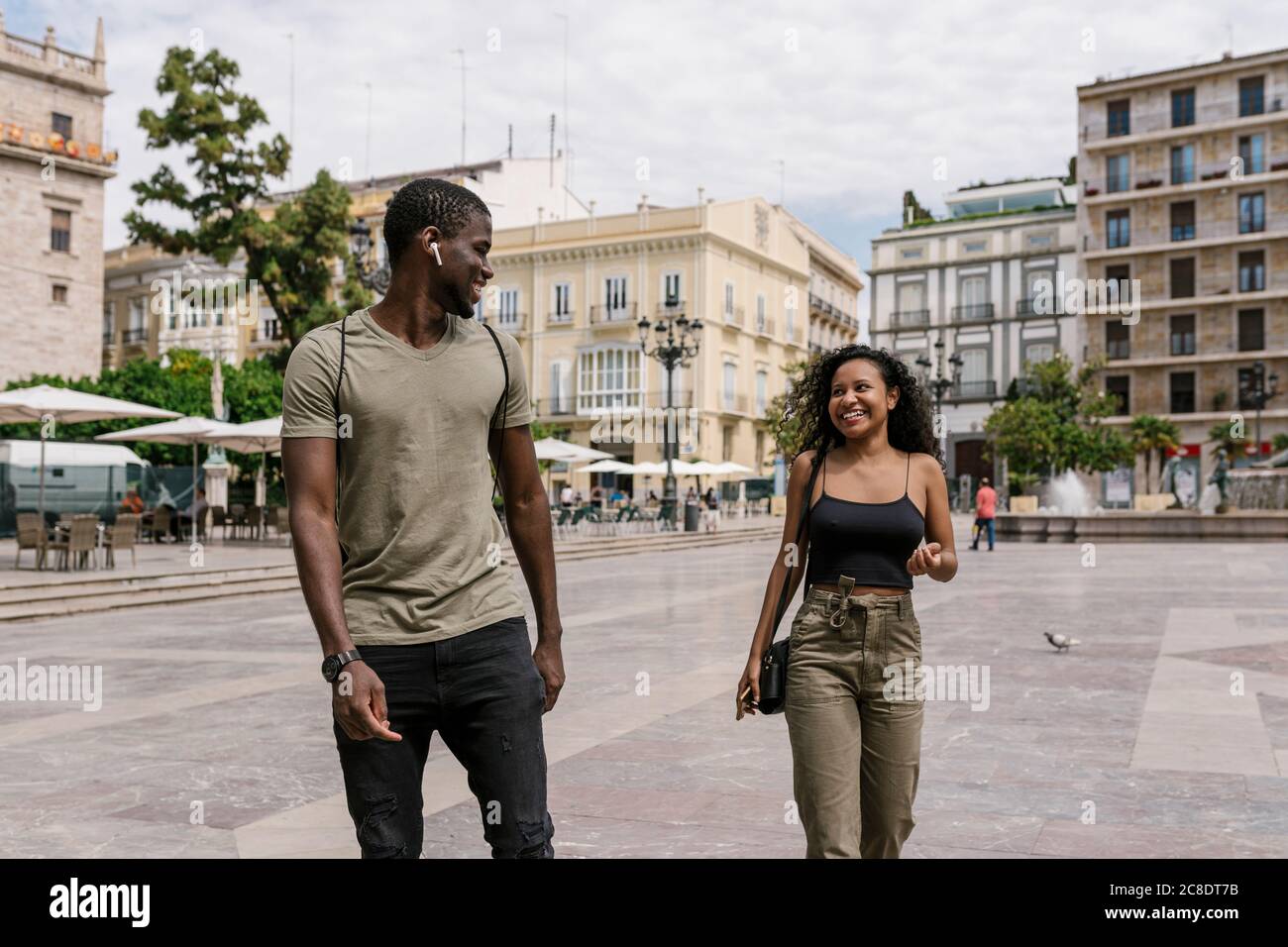 Woman walking at the street hi-res stock photography and images - Alamy