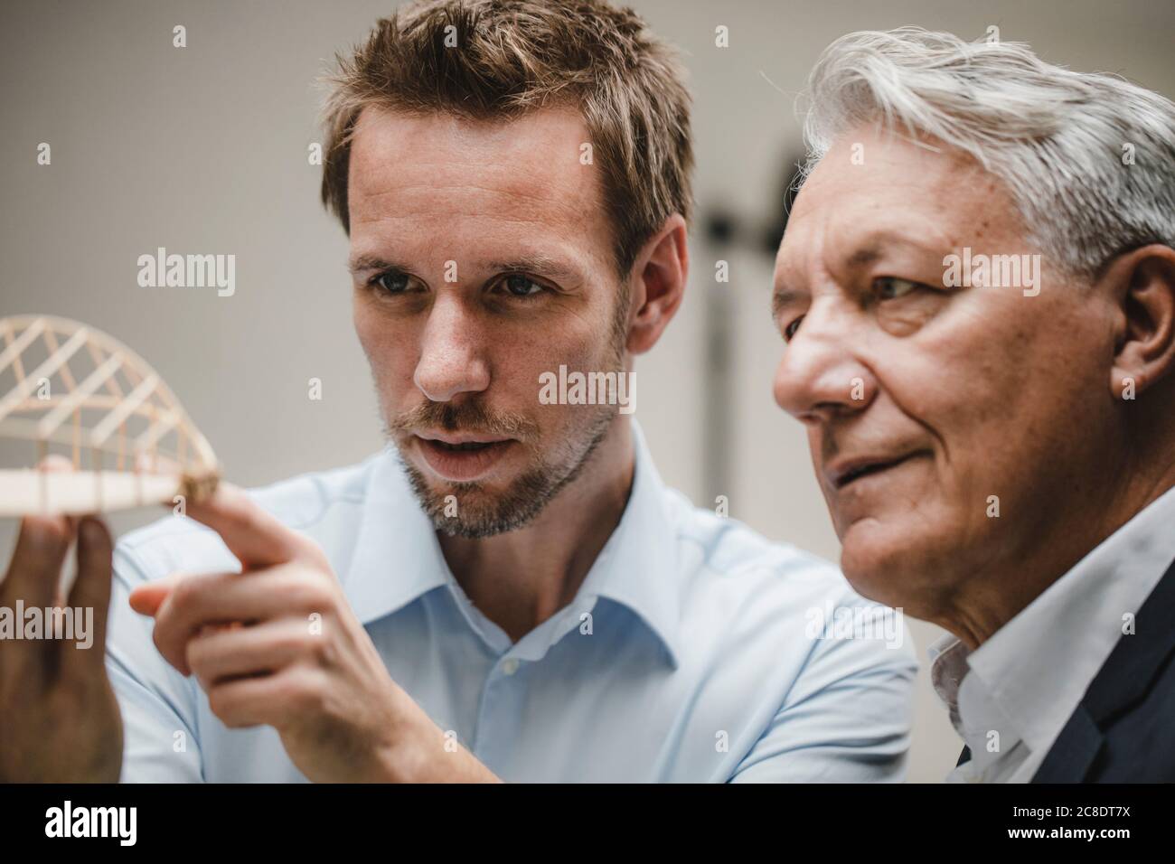 Architect presenting architectural modell to client Stock Photo