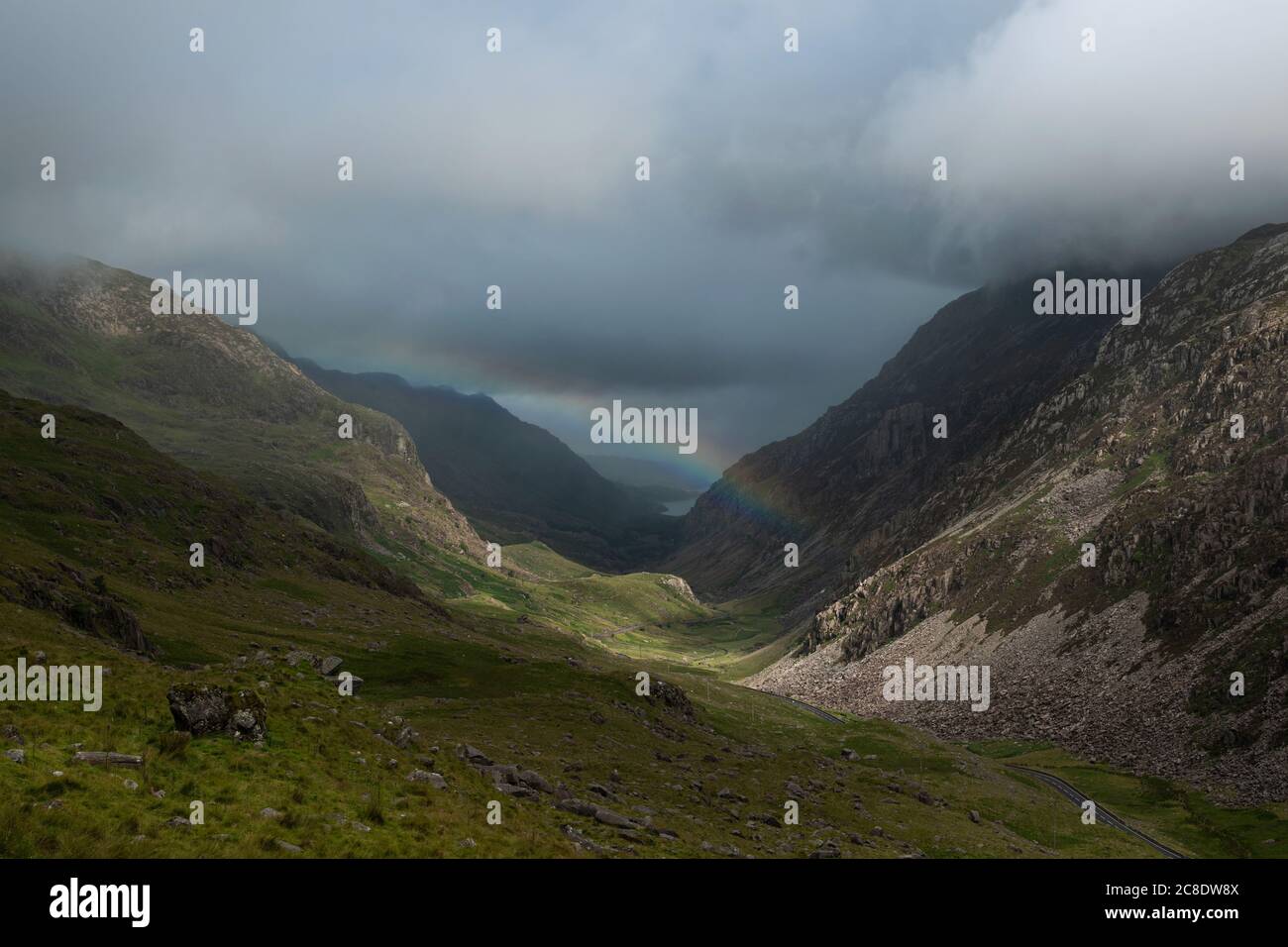 Rainbow in mountains, North Wales Stock Photo