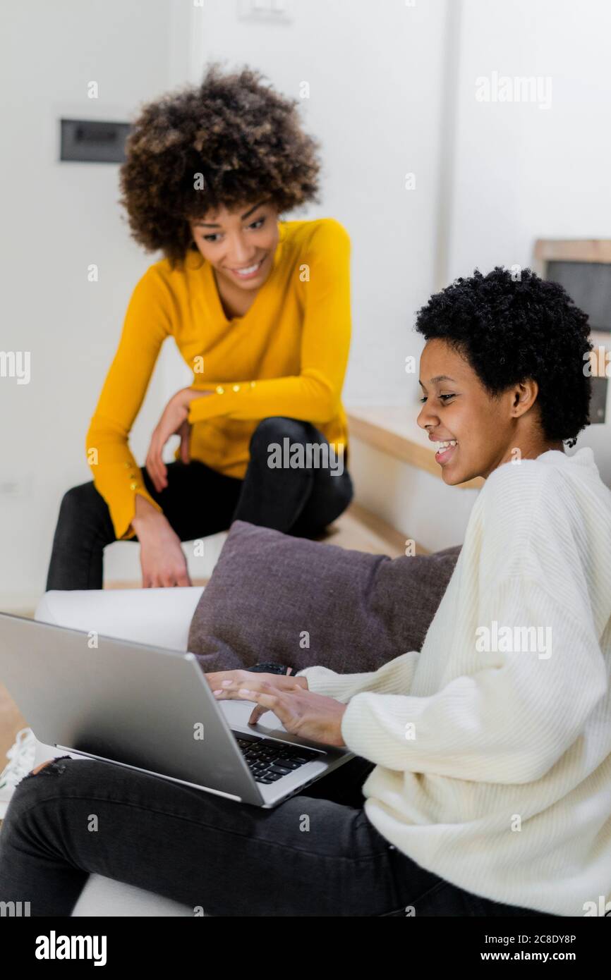 Two Friends Using A Computer Women friends home computer hi-res stock photography and images - Alamy