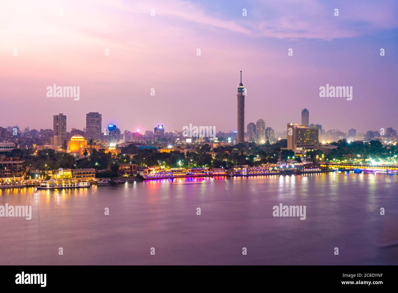 Egypt, Cairo, Nile with Cairo Tower on Gezira Island at dusk Stock Photo
