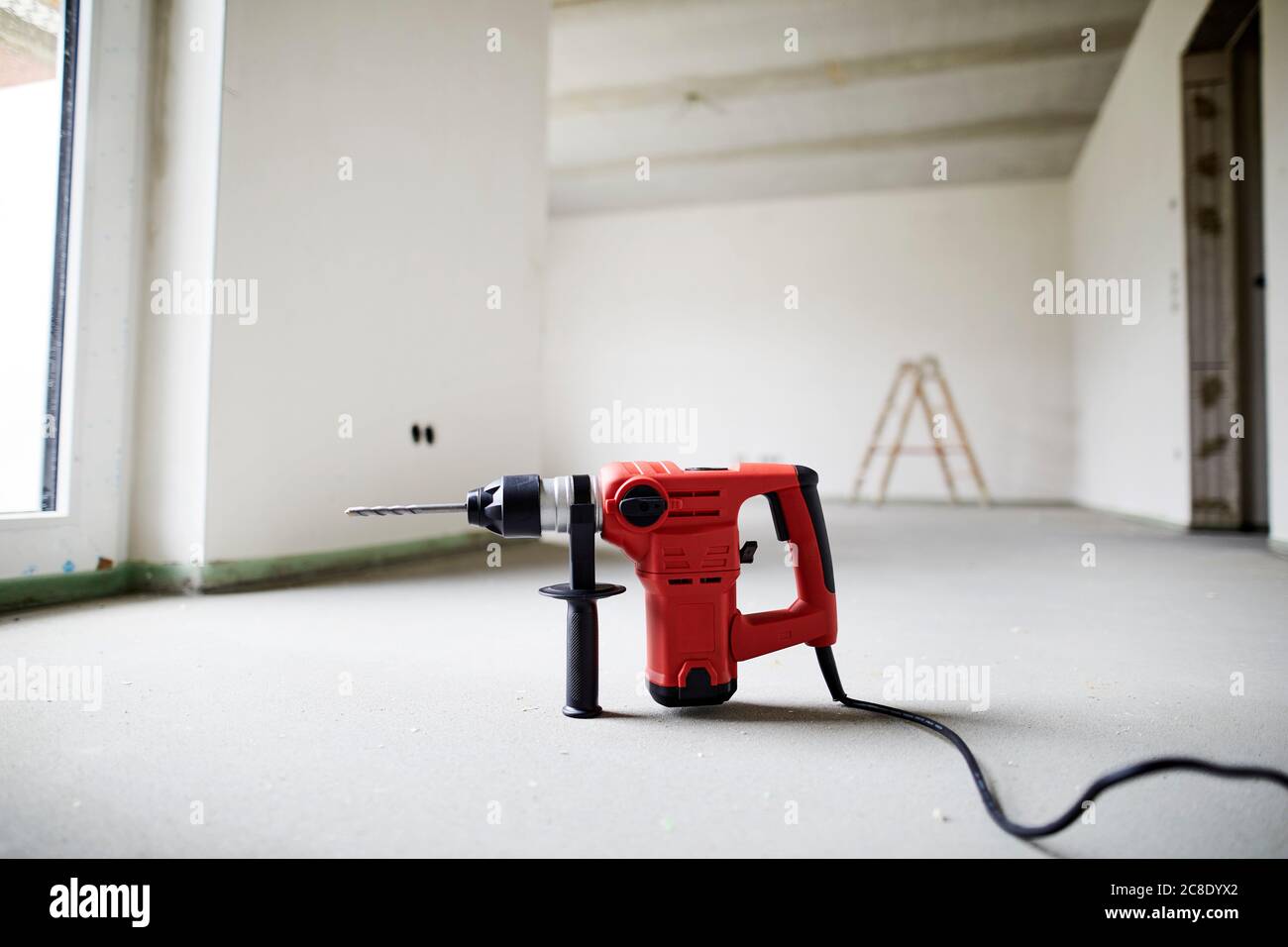 Electric drill on construction site Stock Photo Alamy