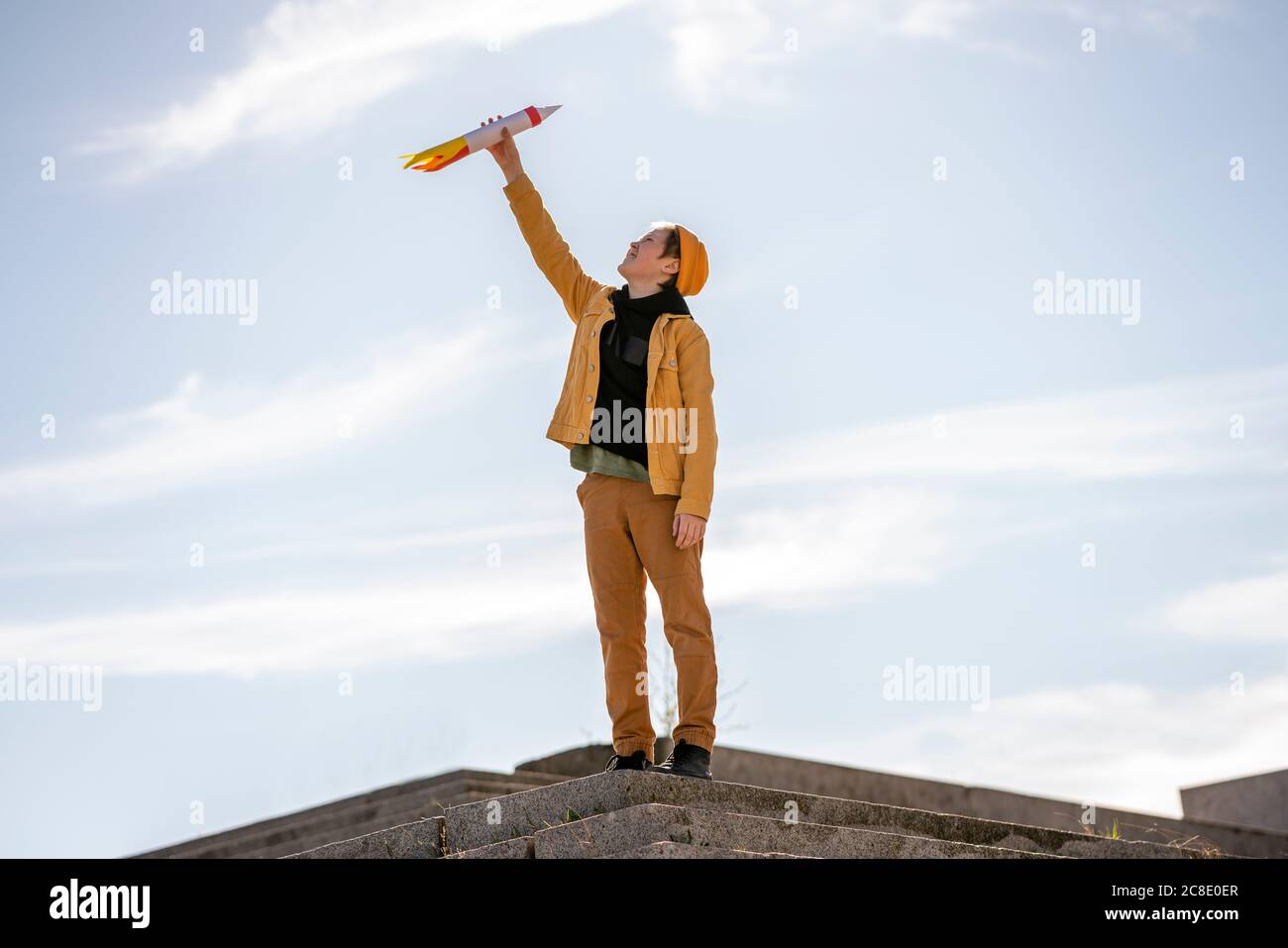 Boy holding rocket toy children hi-res stock photography and images - Alamy