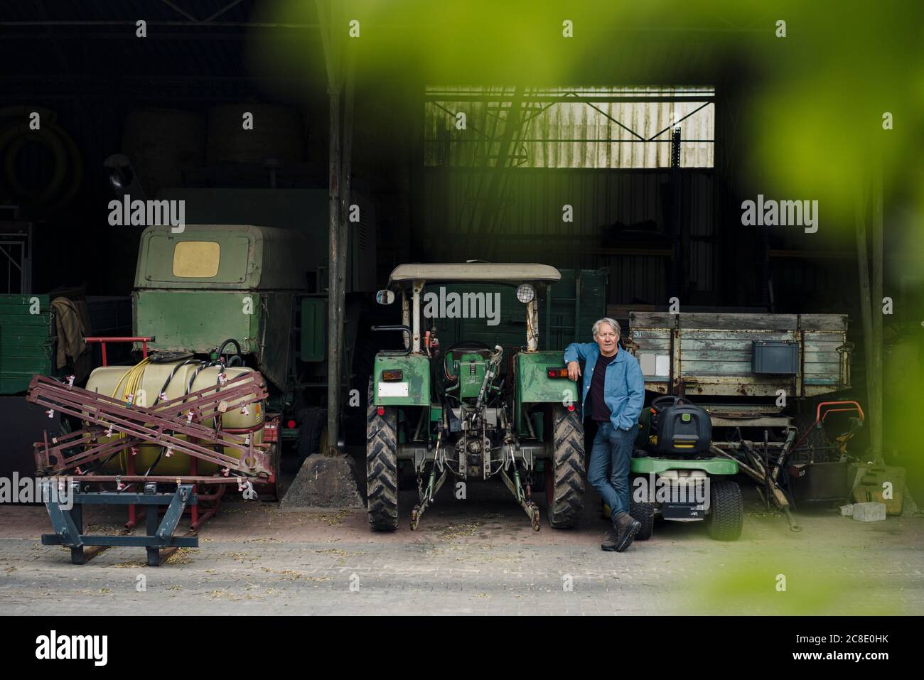 Farmer standing on tractor in hi-res stock photography and images - Alamy