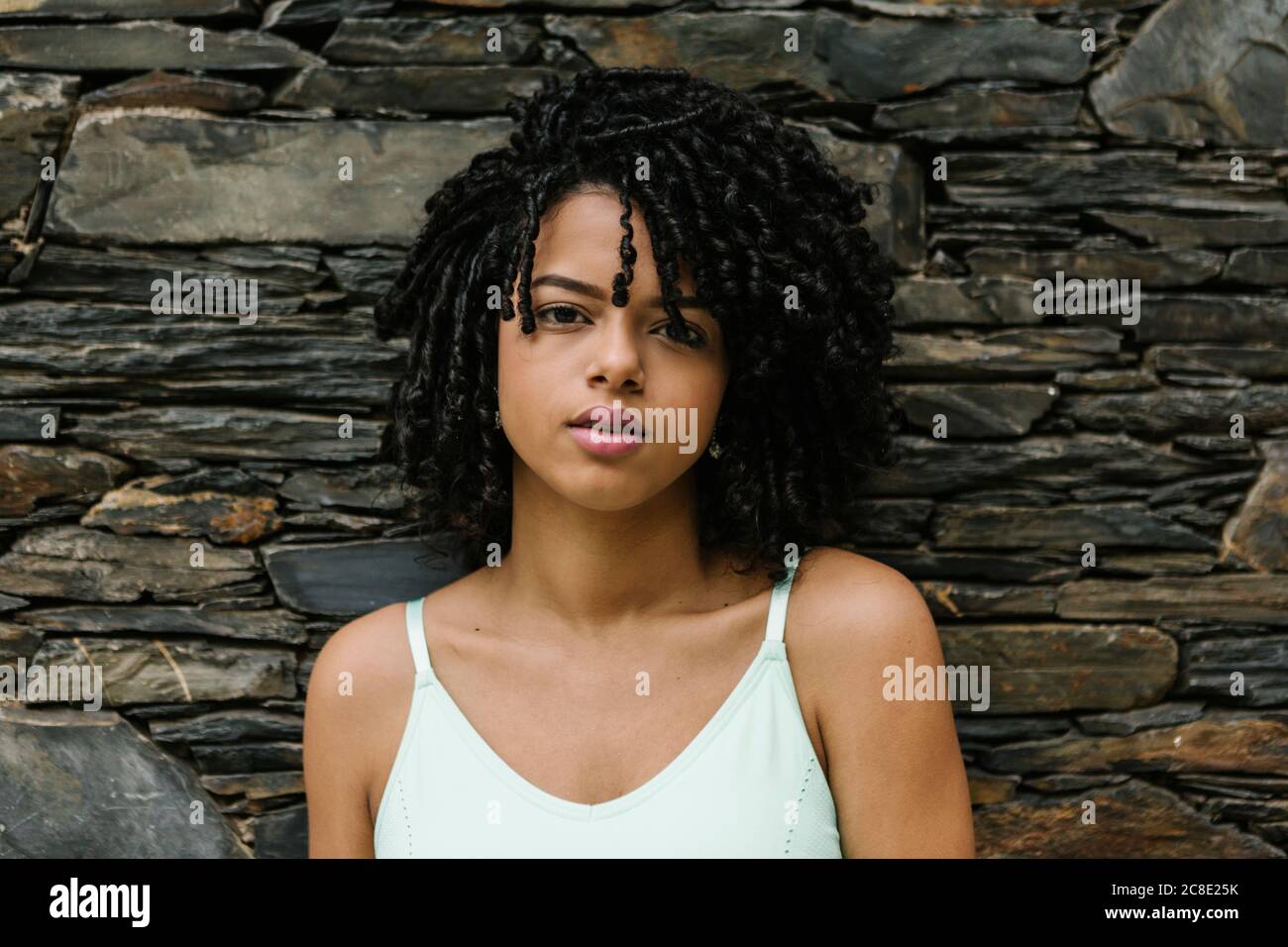 Portrait of curly young woman Stock Photo