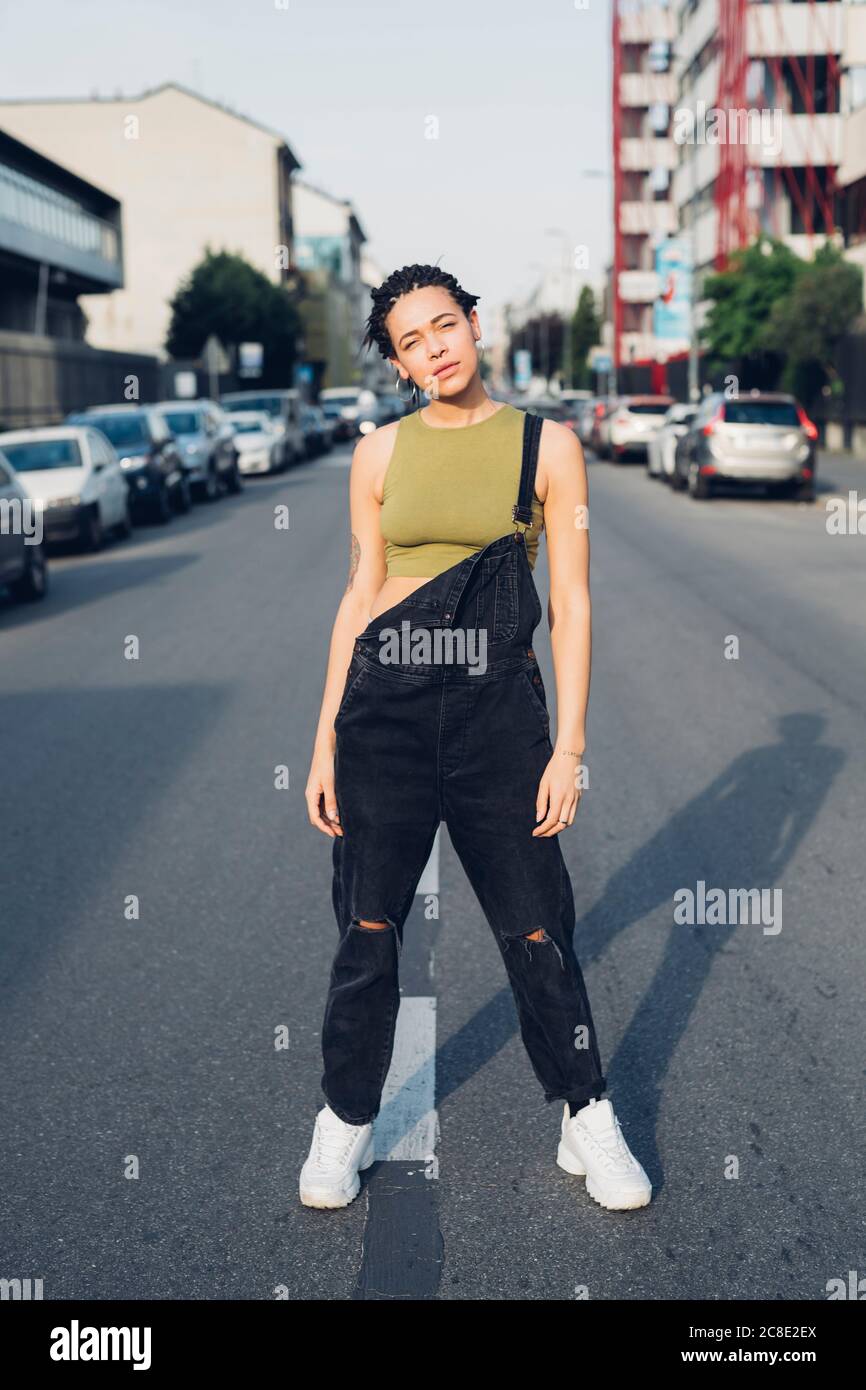 Stylish woman standing street hi-res stock photography and images - Alamy