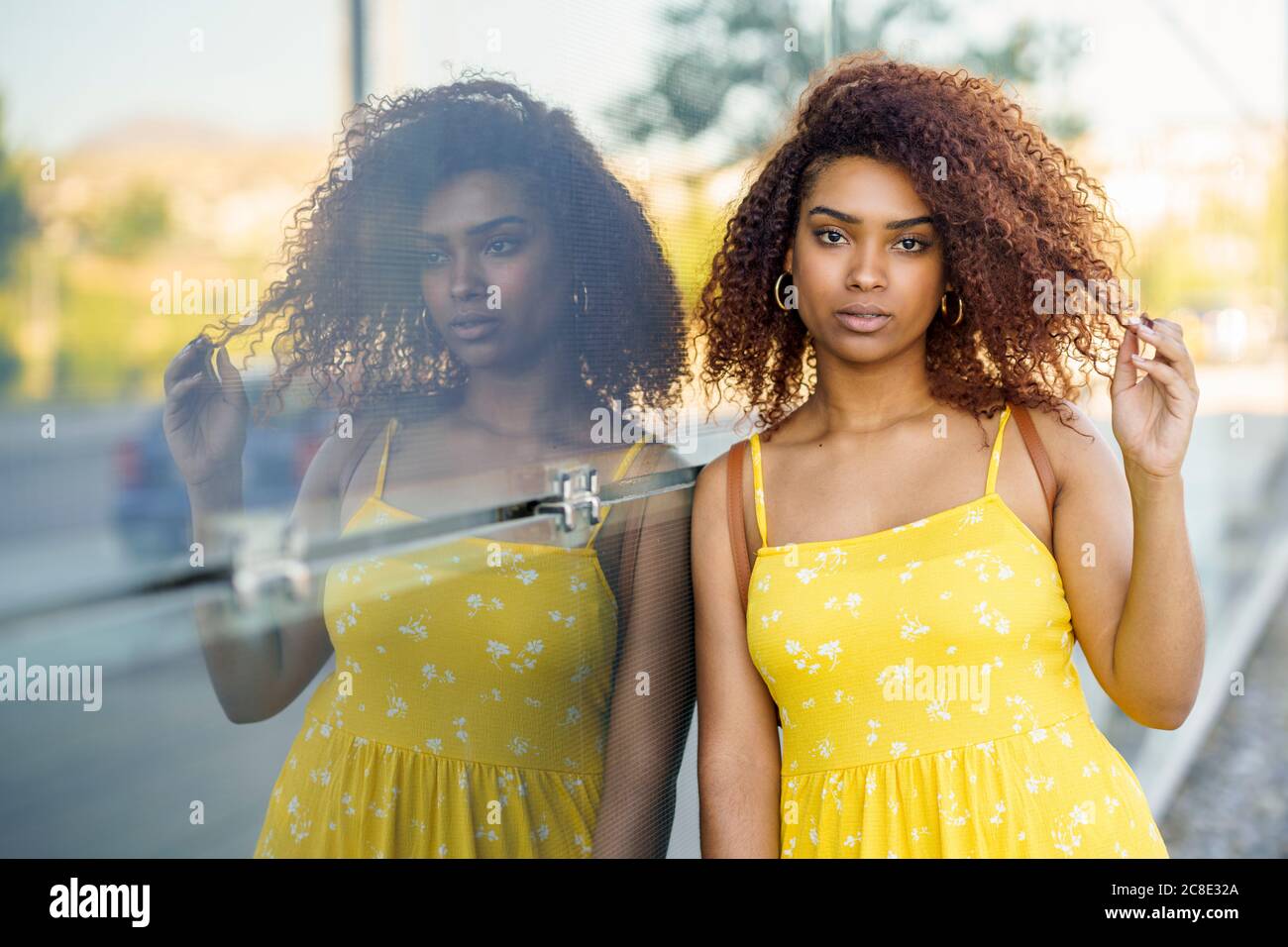 Beautiful woman in yellow dress hi-res stock photography and images - Alamy