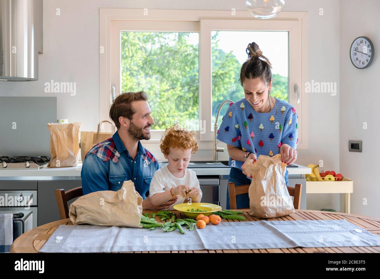 Boy at home in the kitchen hi-res stock photography and images - Alamy
